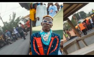 Shatta Wale leads Nima Boys to assault road engineers for not permitted to pass.